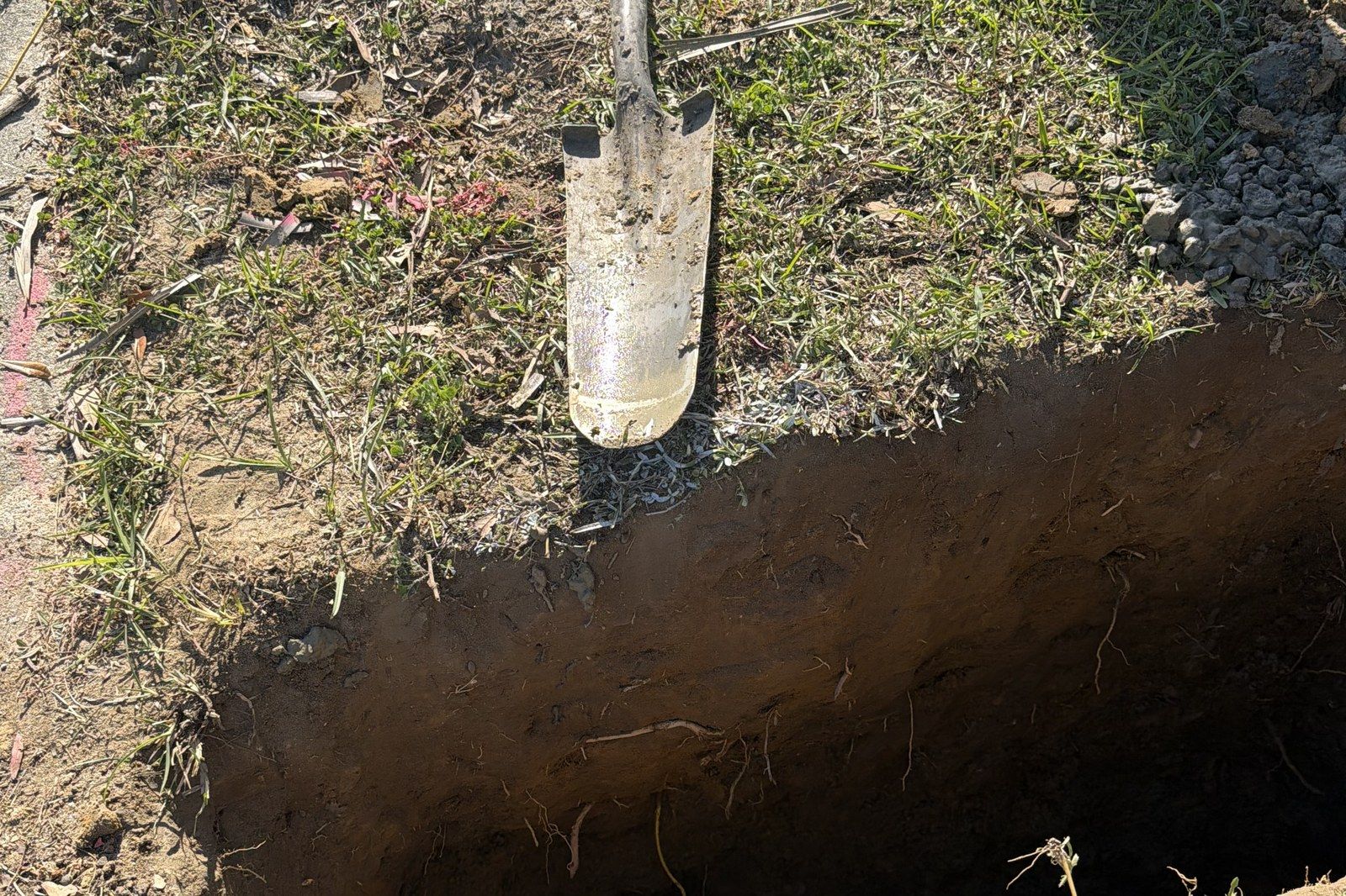 Hand-digging to find a utility before the bore